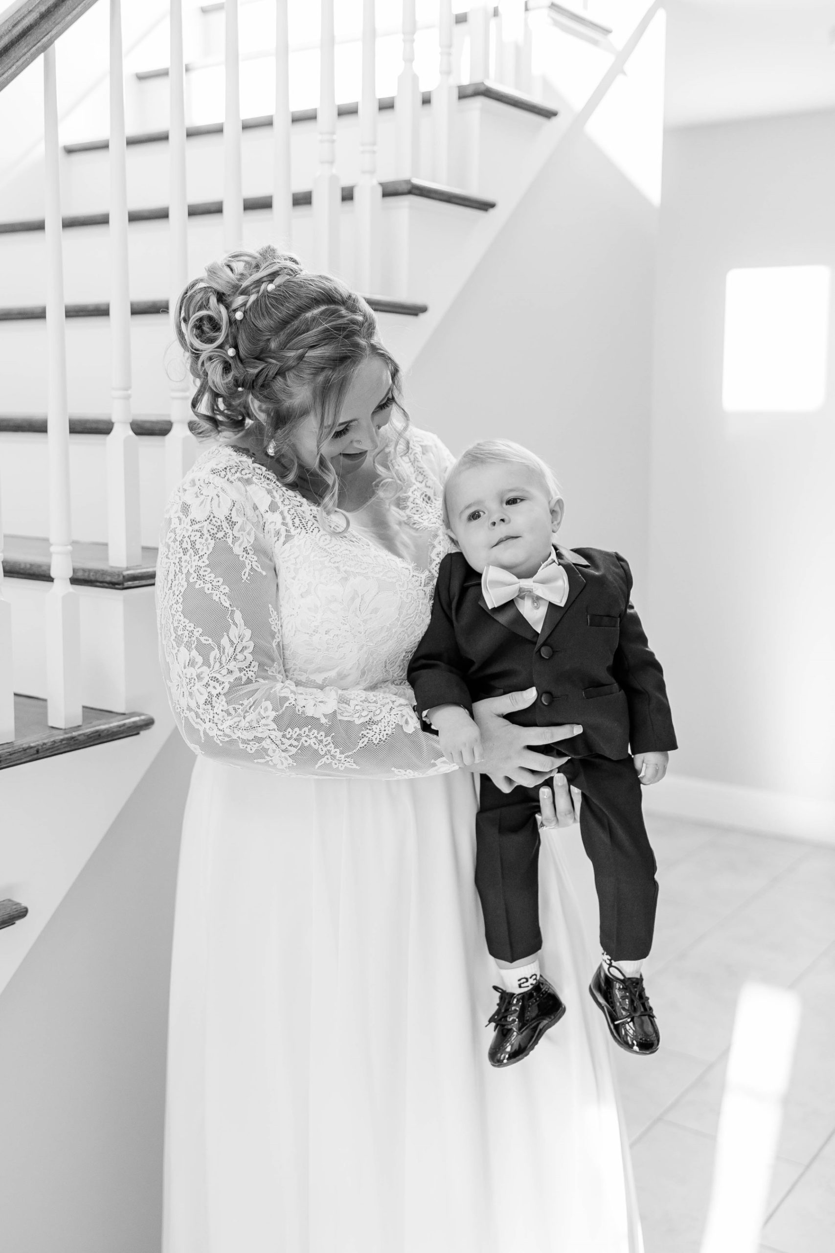 Bride smiles at her son at Great Neck Country Club Wedding
