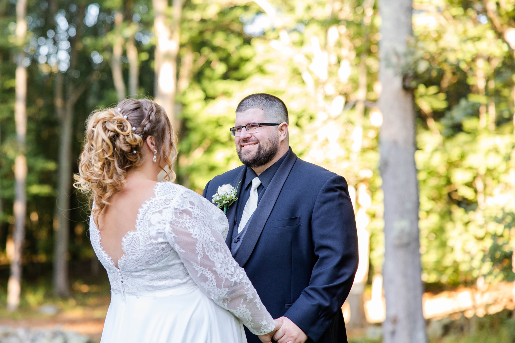 Groom smiles at bride at Great Neck Country Club Wedding