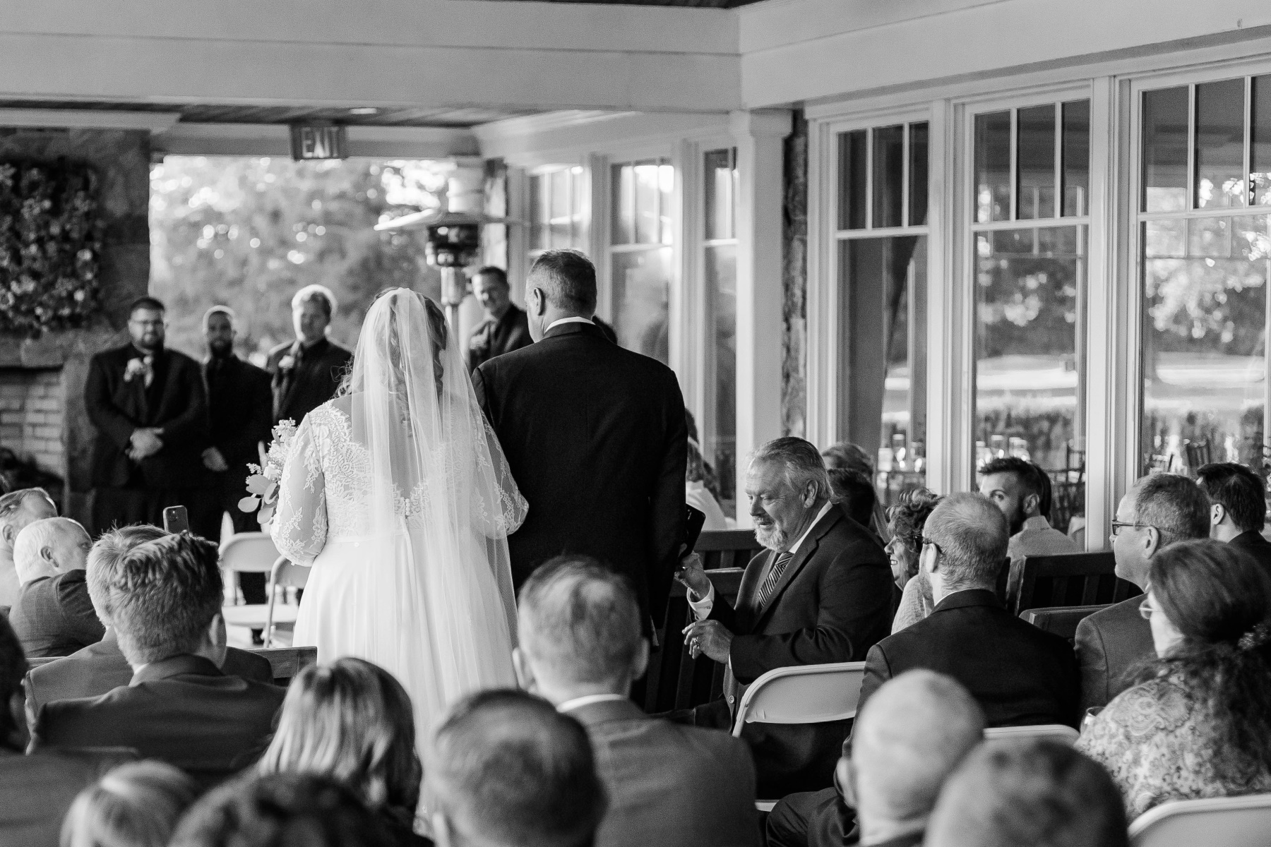 Bride and groom walk down the aisle during the ceremony at Great Neck Country Club Wedding