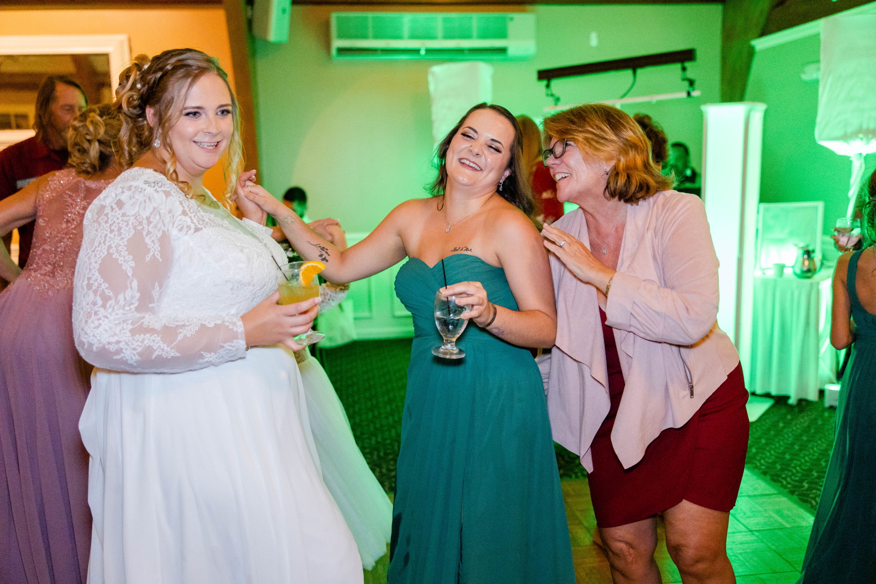 Bride dances with maid of honor at Great Neck Country Club Wedding