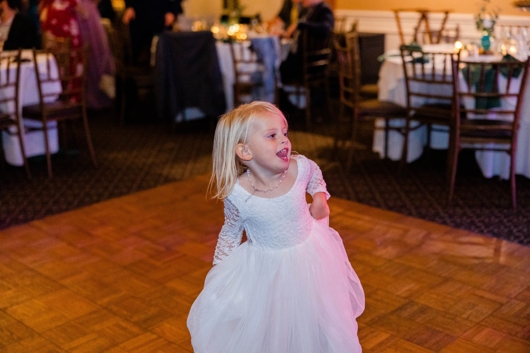 Flower girl dances at Great Neck Country Club Wedding