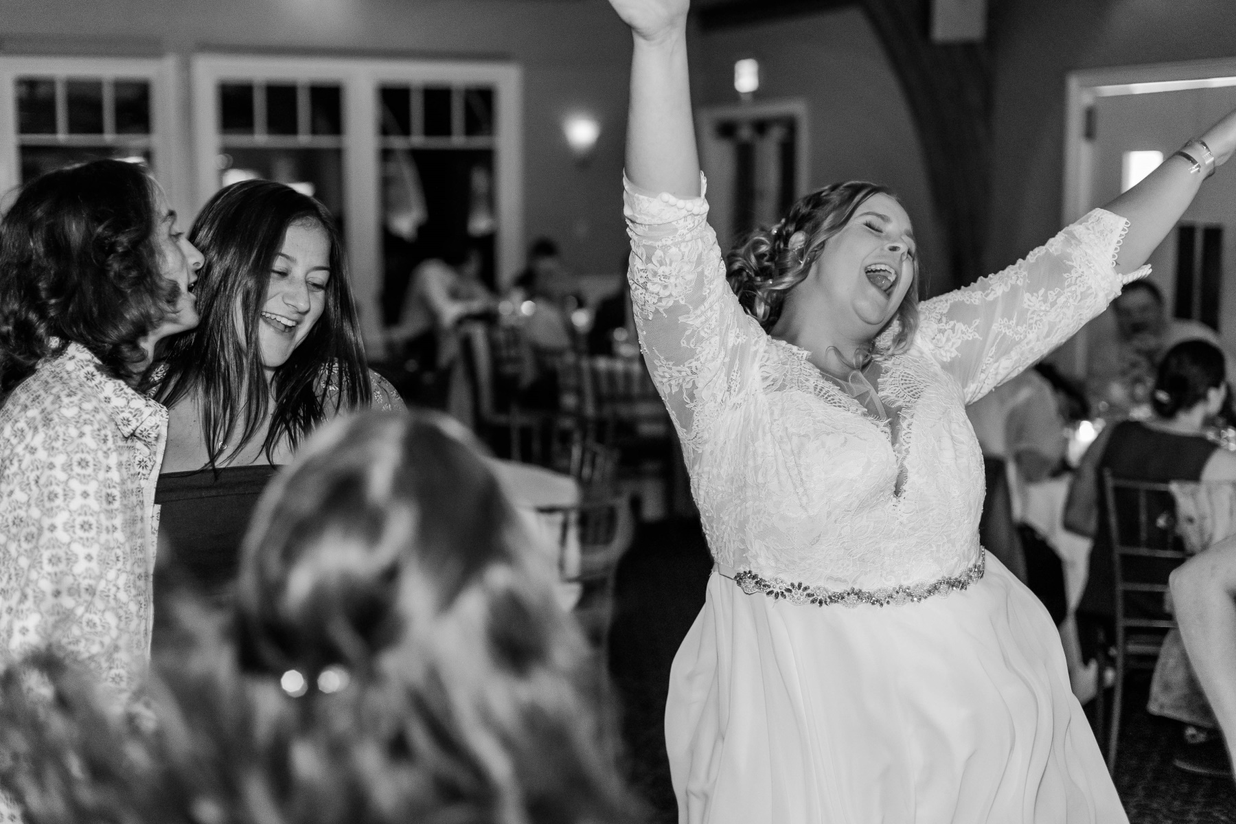 Bride excitedly sings along while dancing at Great Neck Country Club Wedding